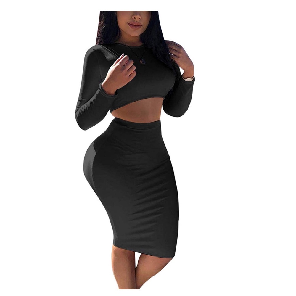 Black crop long sleeve top and skirt set.